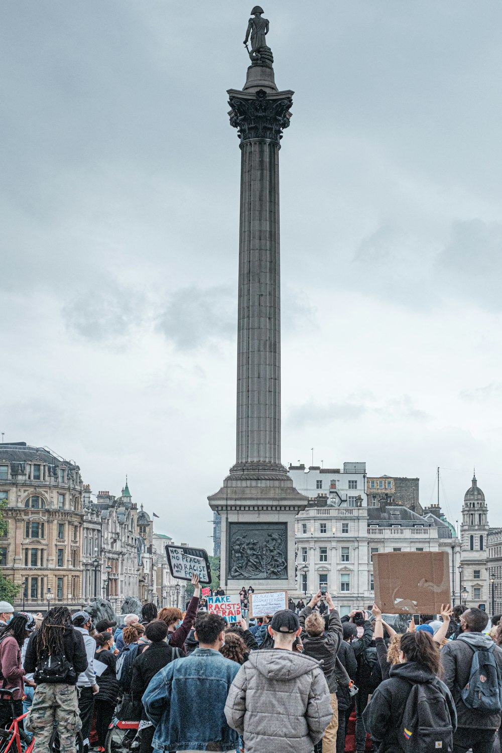 people walking on street near buildings during daytime