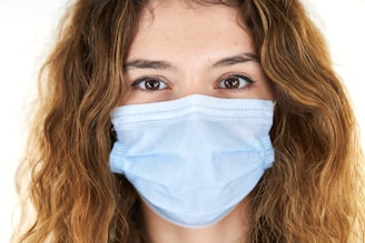 woman with white face mask