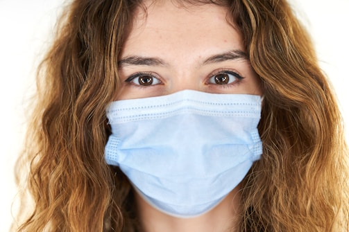woman with white face mask
