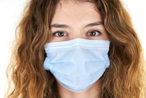 woman with white face mask