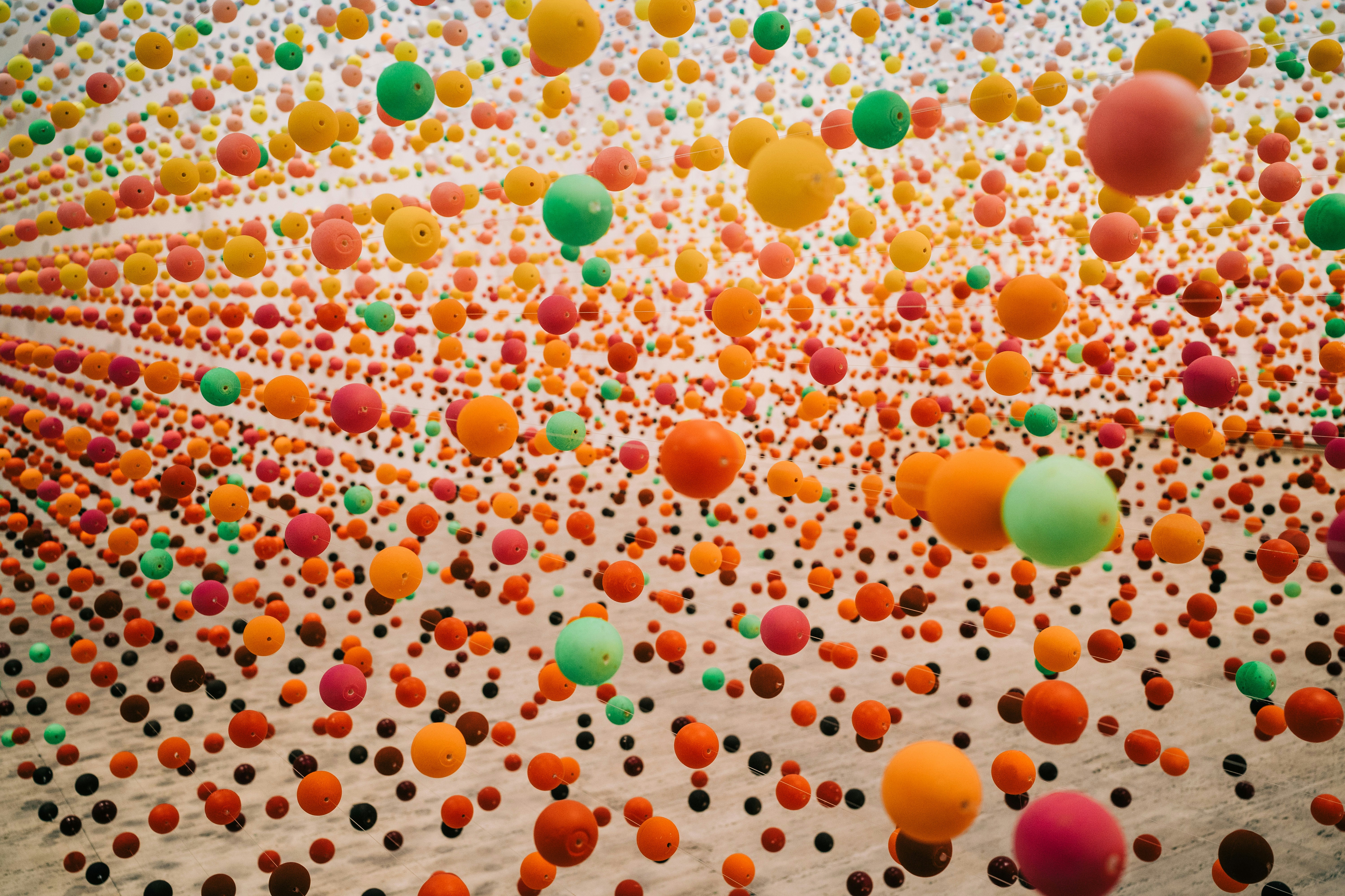 pink yellow and white balloons