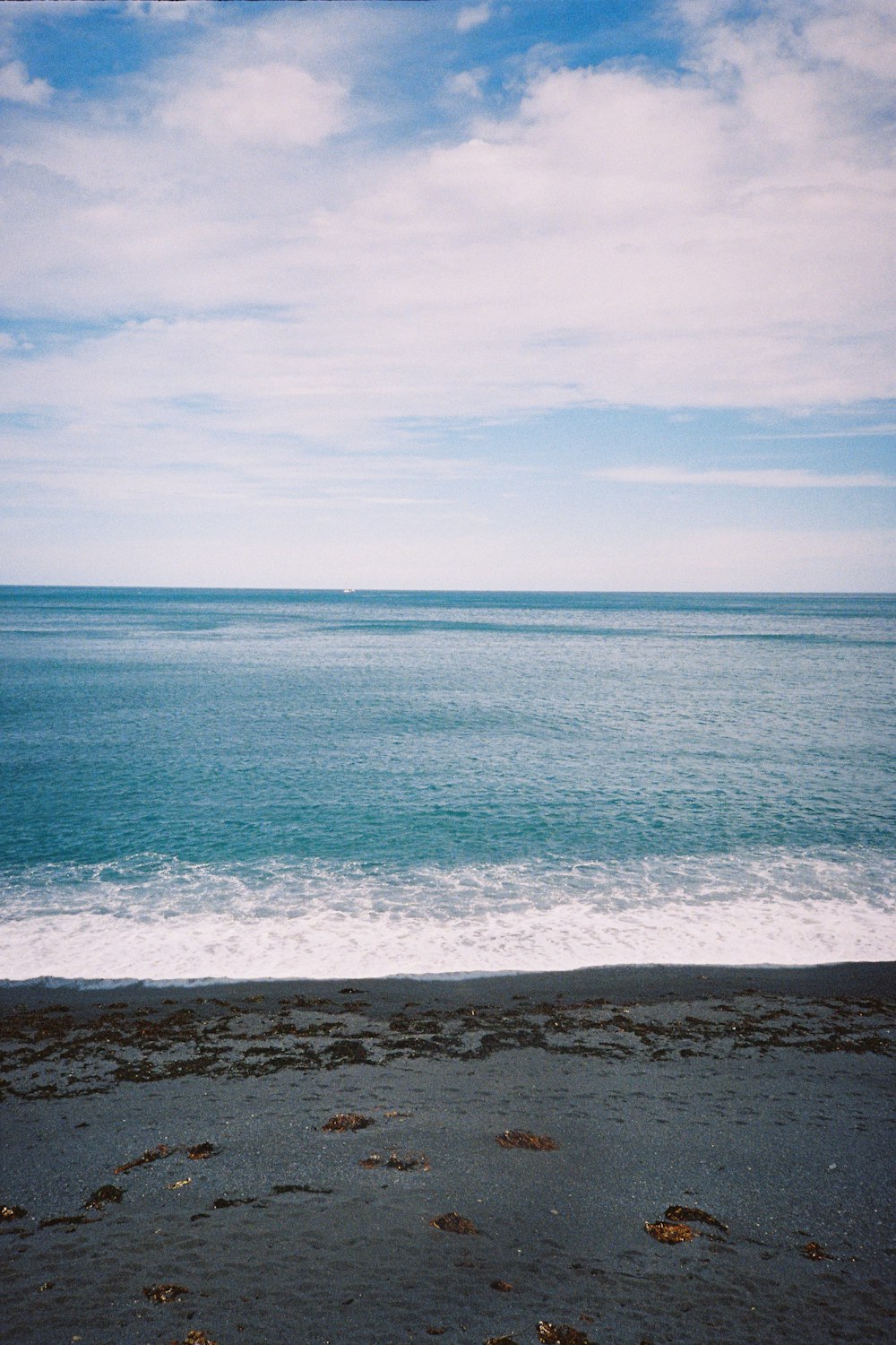 blue sea under blue sky during daytime