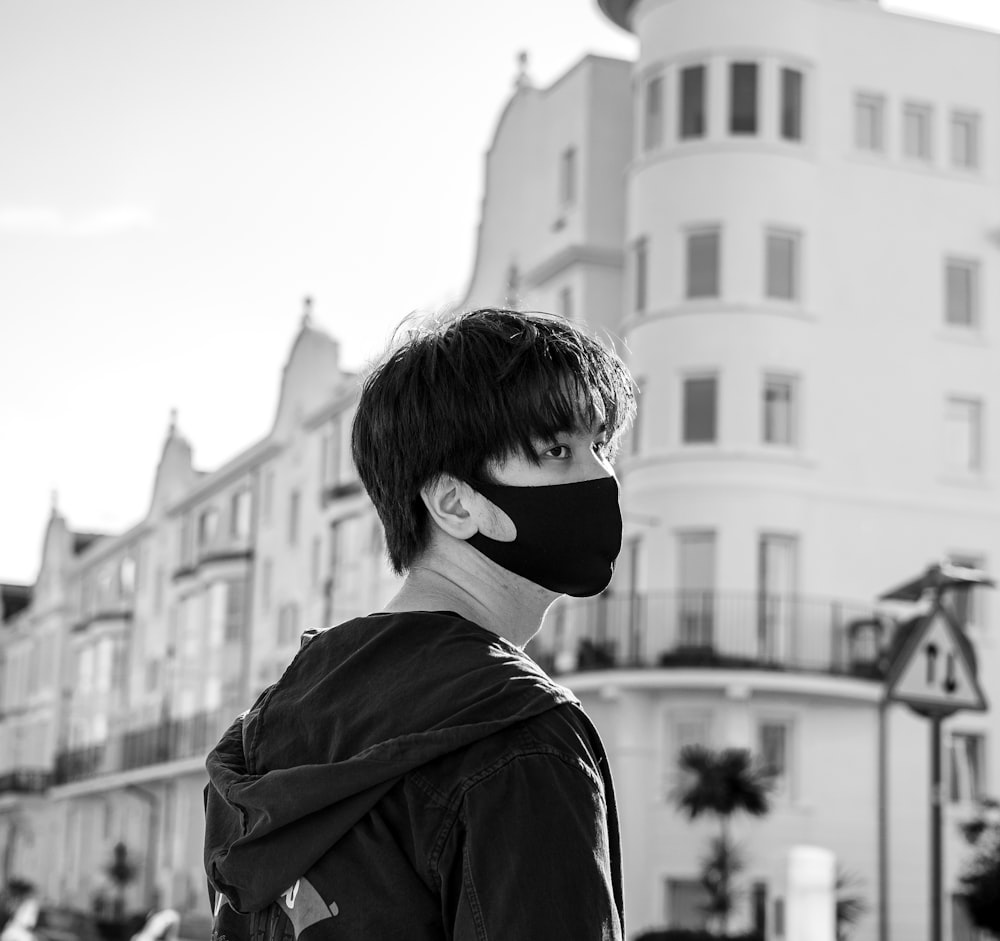 grayscale photo of woman in black jacket