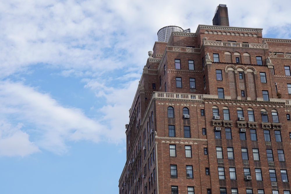 brown concrete building under blue sky during daytime