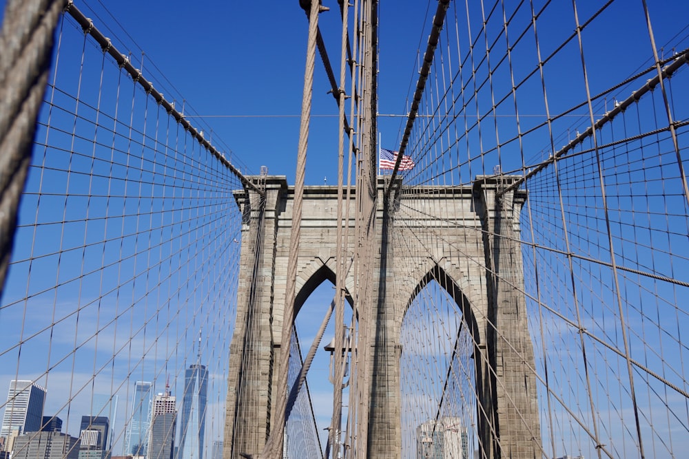 brown bridge under blue sky during daytime