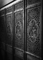 Decorative wooden wall hangings featuring detailed craftsmanship.