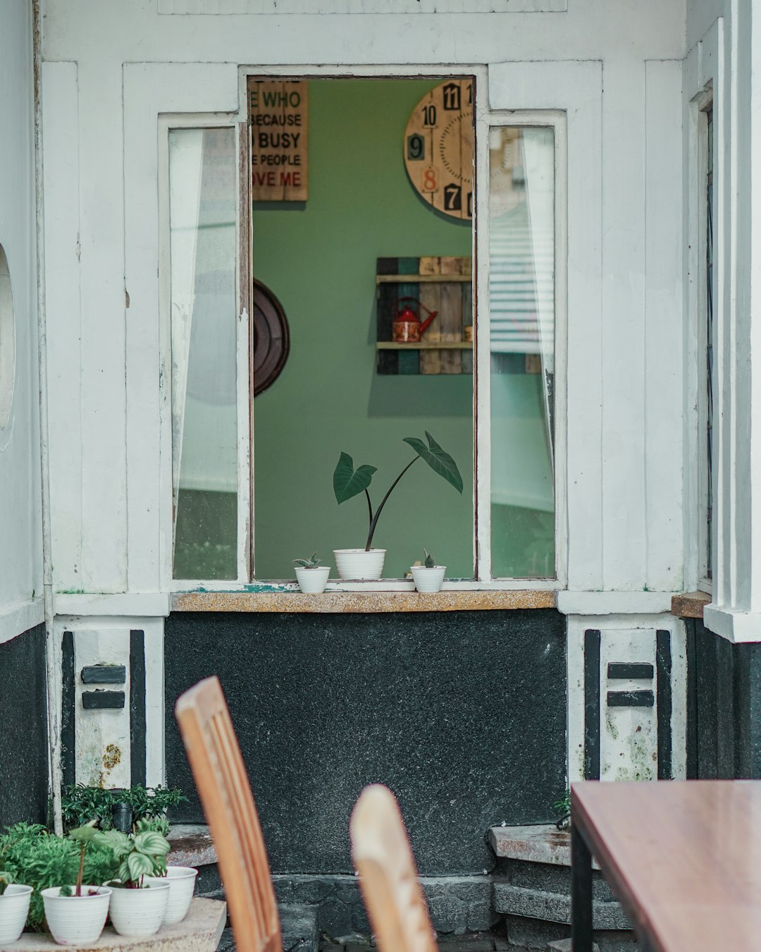 white wooden framed glass window