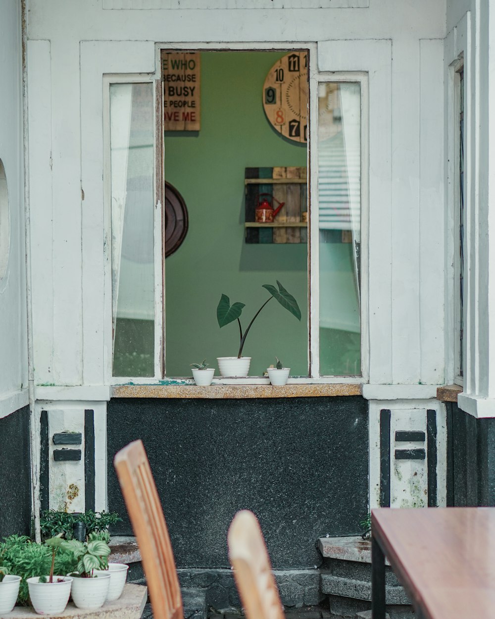 white wooden framed glass window