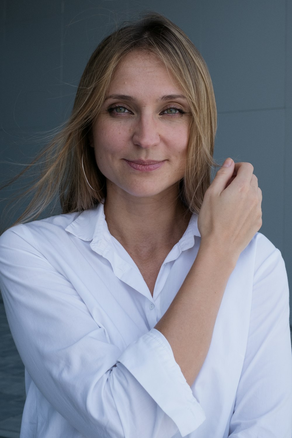 woman in white button up shirt