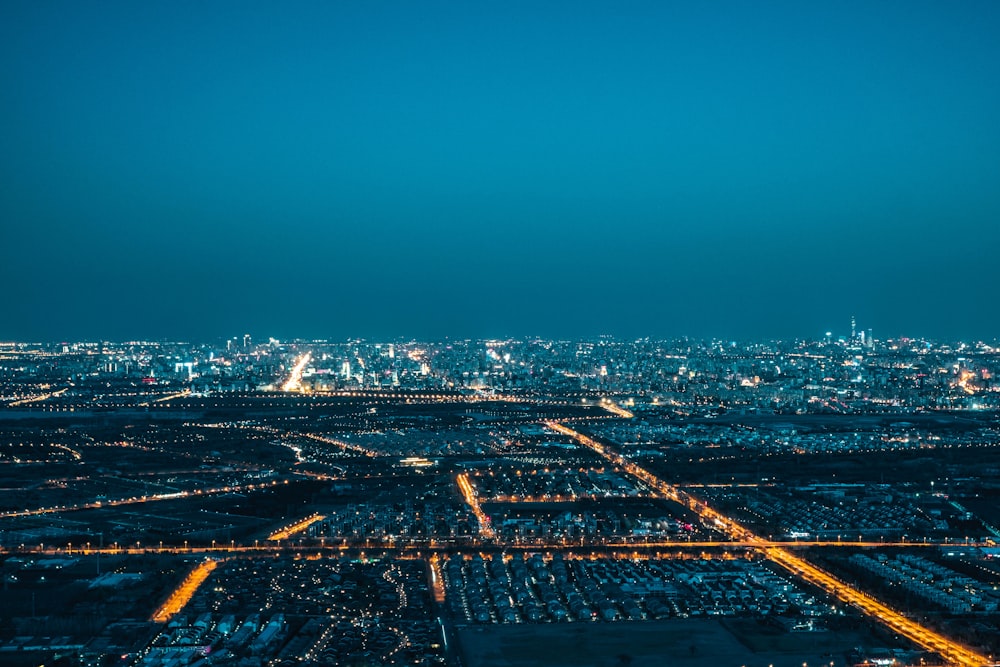 an aerial view of a city at night