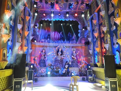 VIP darshan experience with guided access, framed by the vibrant festival backdrop.