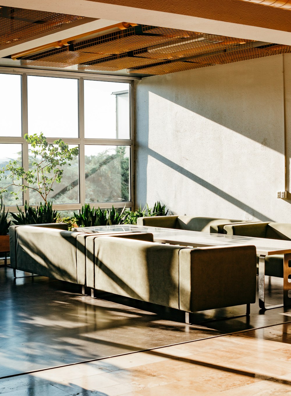 white and brown sectional couch