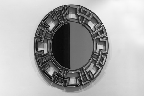 Decorative wall mirror with clean lines enhancing a stylish interior space