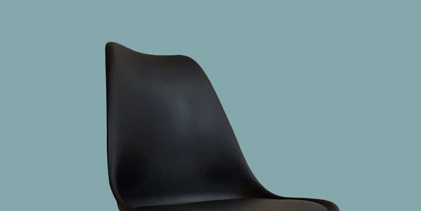 black and brown wooden chair