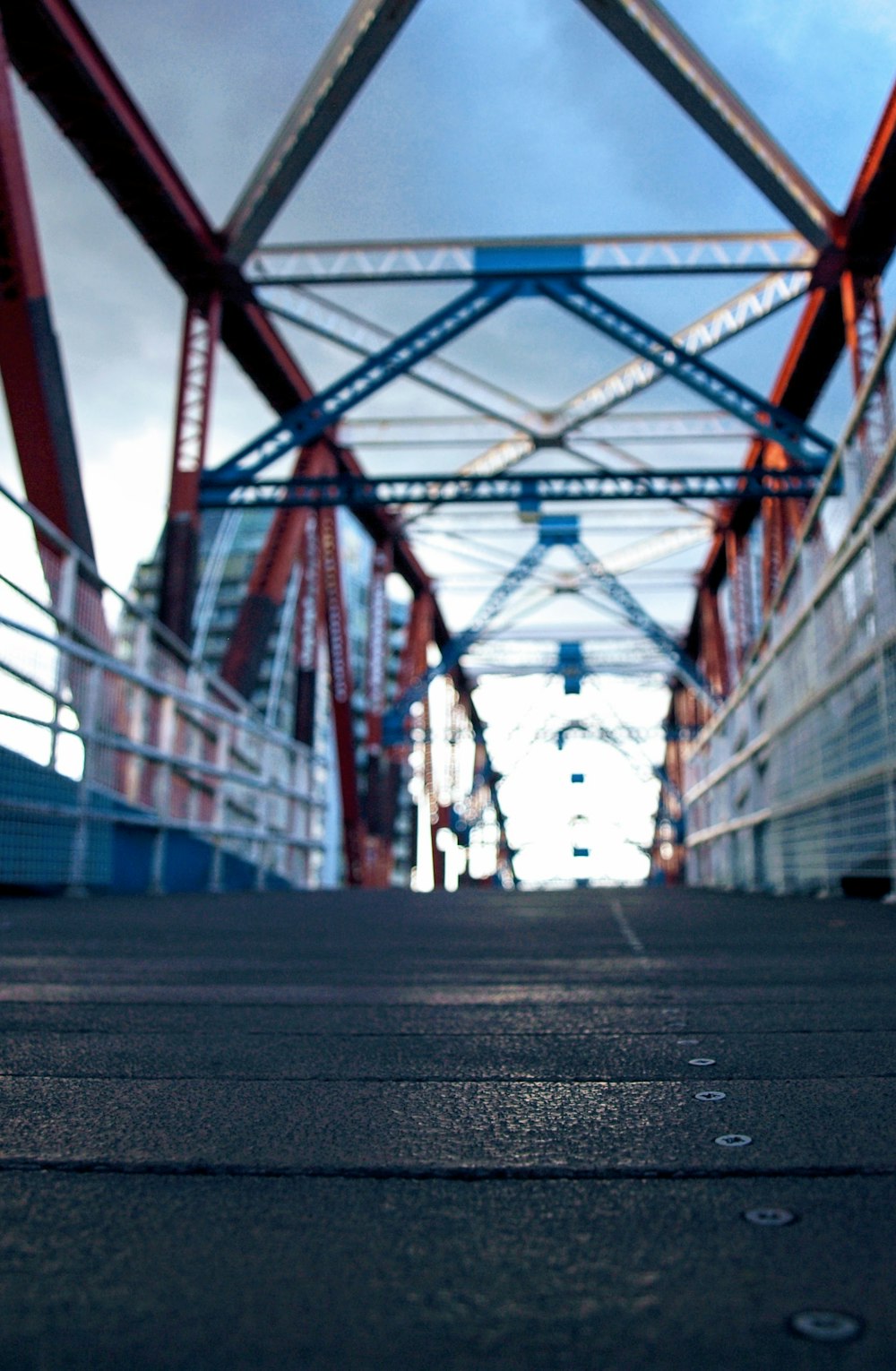 red metal bridge during daytime