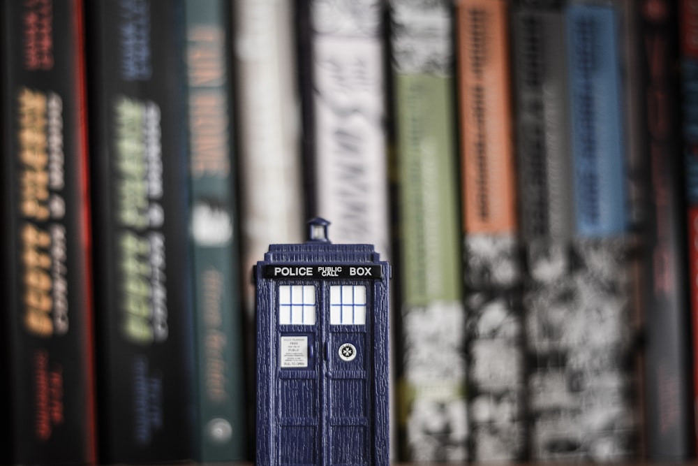 black lantern on books in tilt shift lens