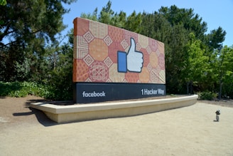 a large sign with a thumbs up on it