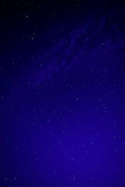 A minimalist celestial map with fine-line constellations against a deep navy background.