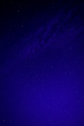 A minimalist celestial map with fine-line constellations against a deep navy background.