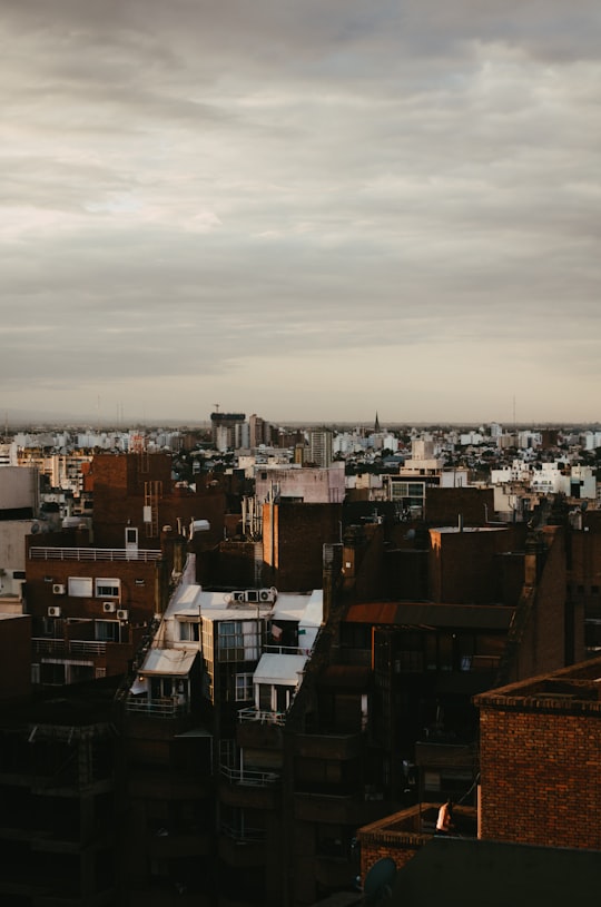 brown and white concrete buildings during daytime in Córdoba Argentina