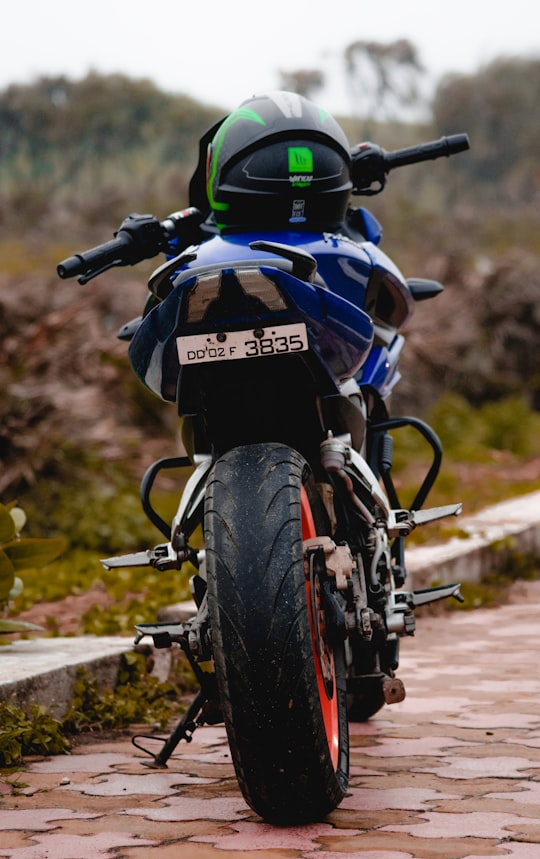 blue and black honda motorcycle in Diu India