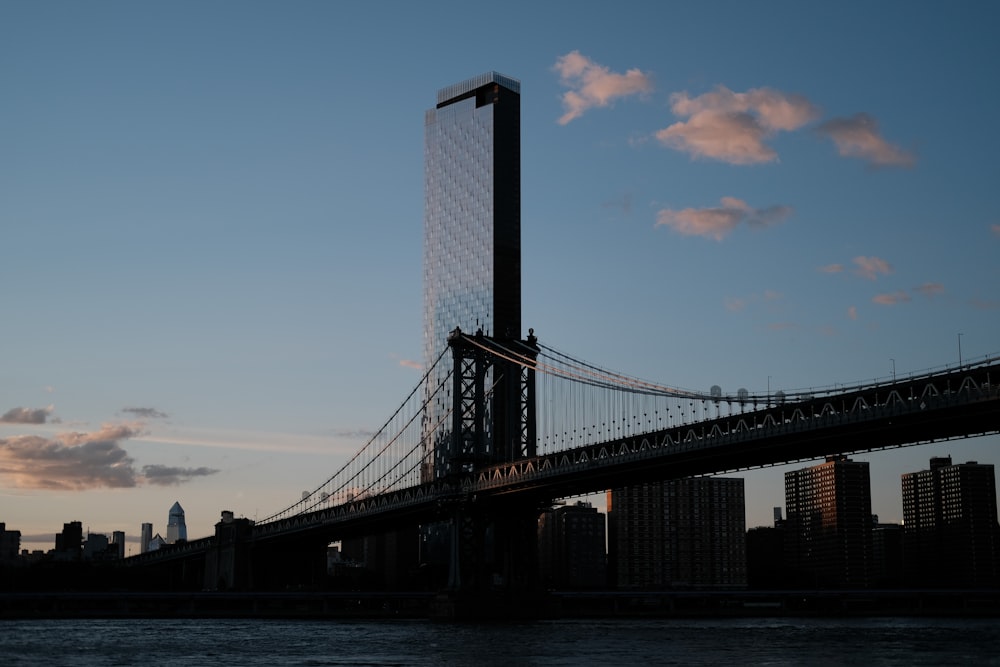 black bridge under blue sky during daytime