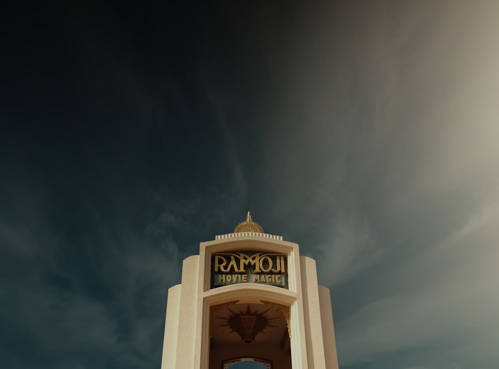 white concrete building under gray sky