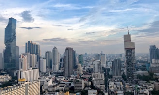 city buildings under blue sky during daytime