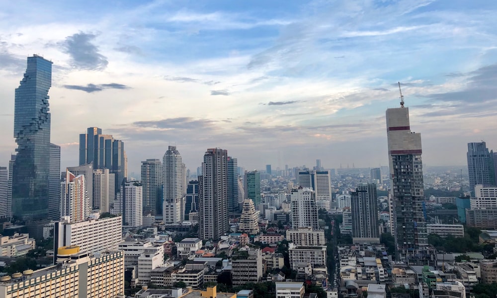 city buildings under blue sky during daytime