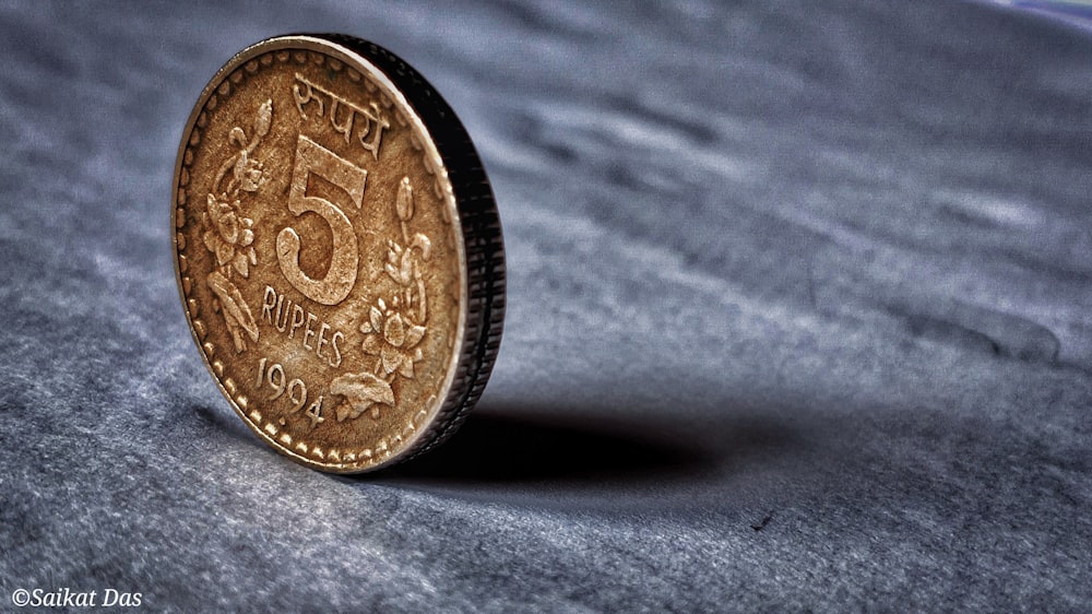 gold and silver round coin