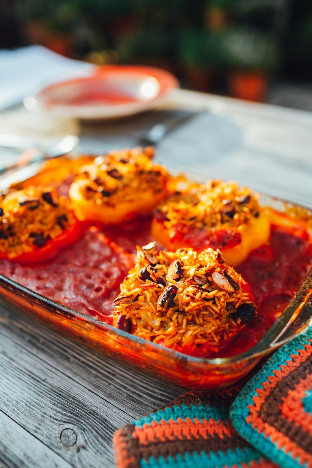 brown and red dish on brown wooden tray