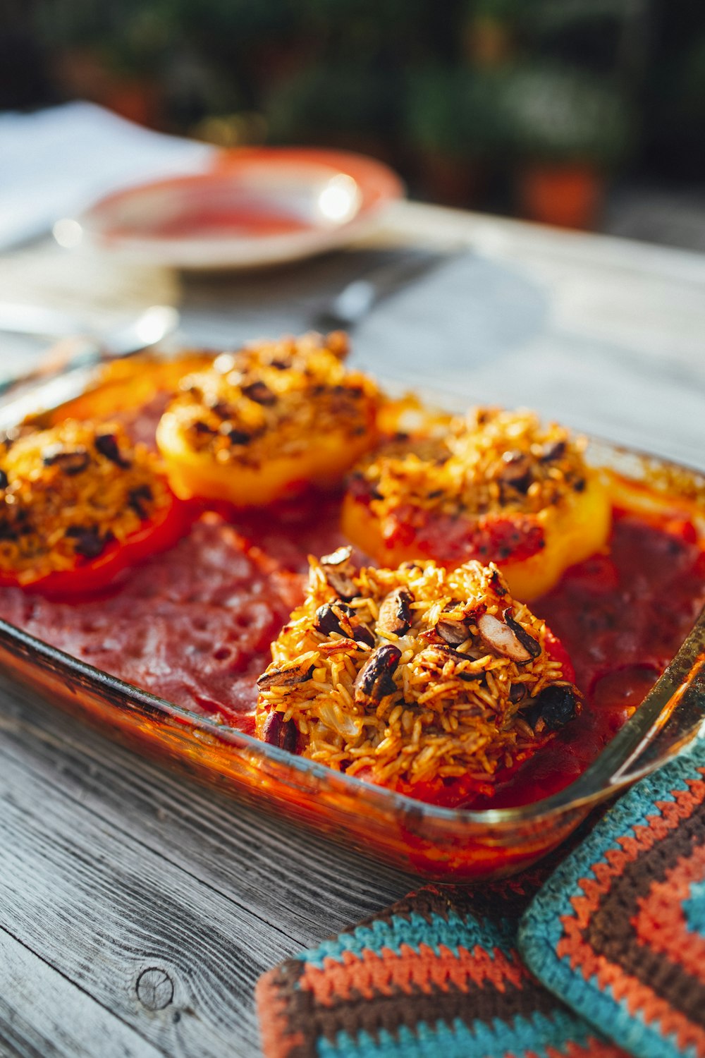 brown and red dish on brown wooden tray