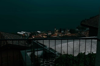 A cozy flat with balcony overlooking a peaceful village street.