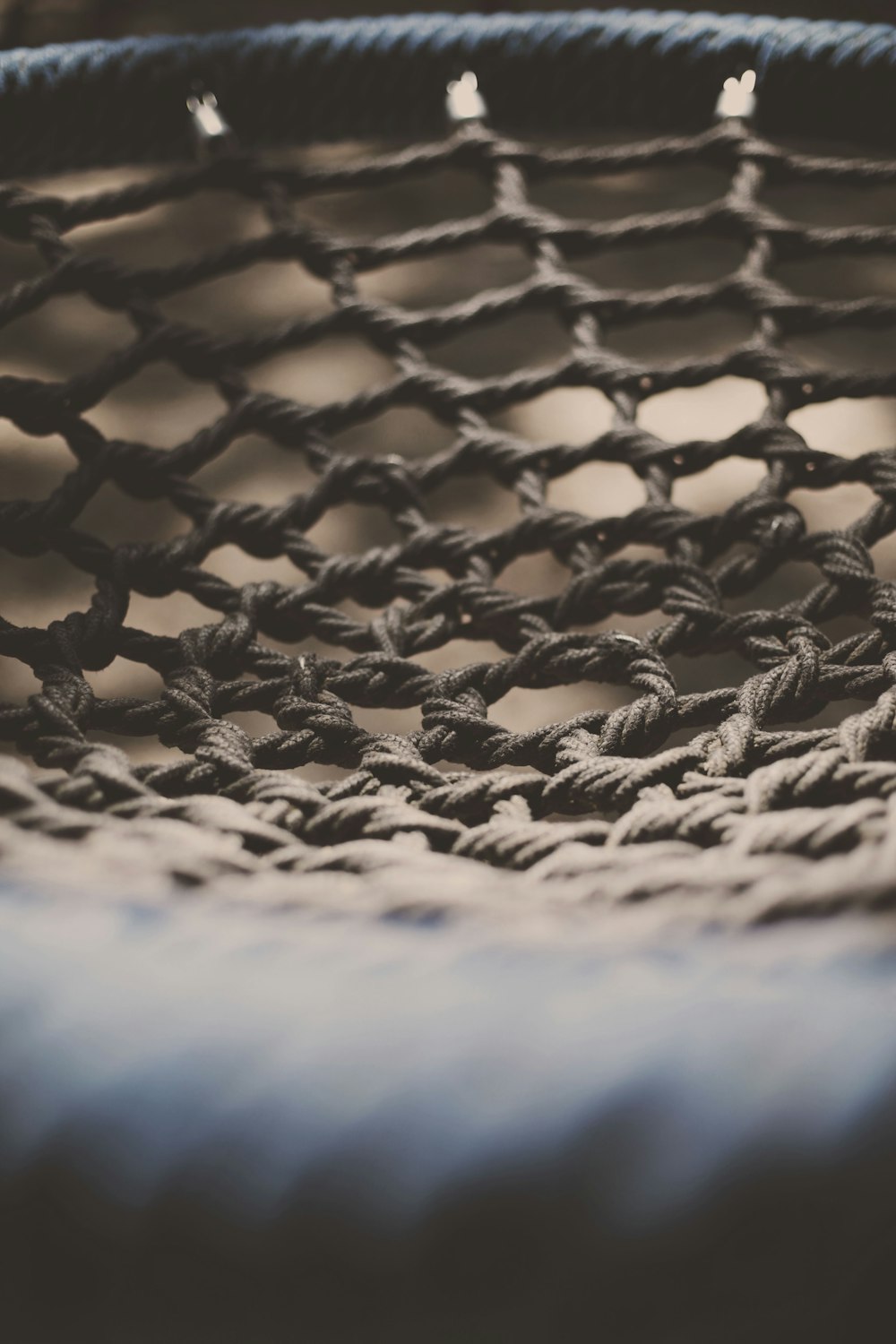 black and white textile on blue textile