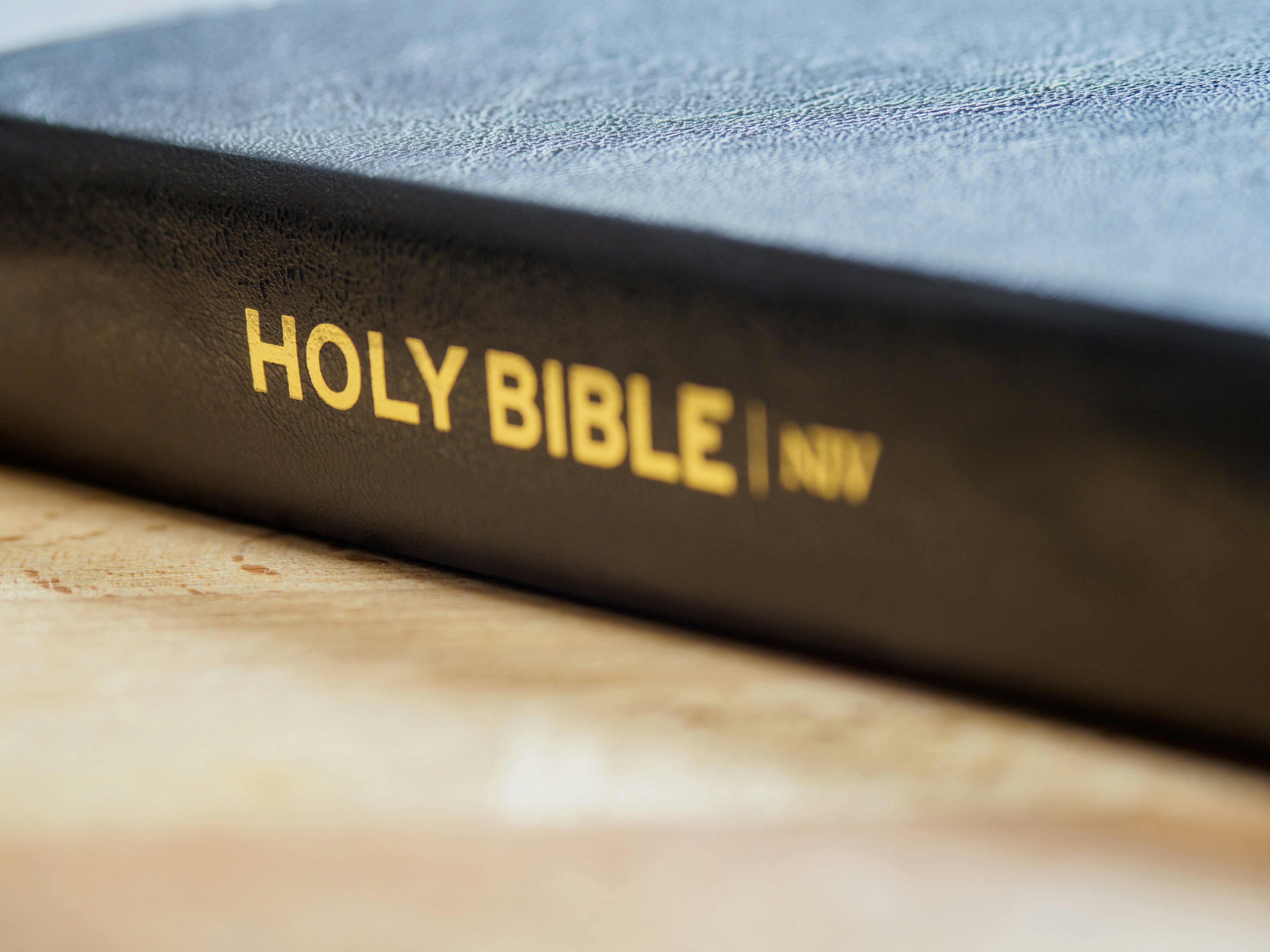 blue and yellow box on brown wooden table