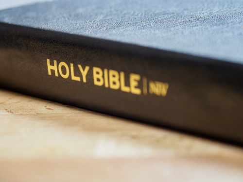 blue and yellow box on brown wooden table
