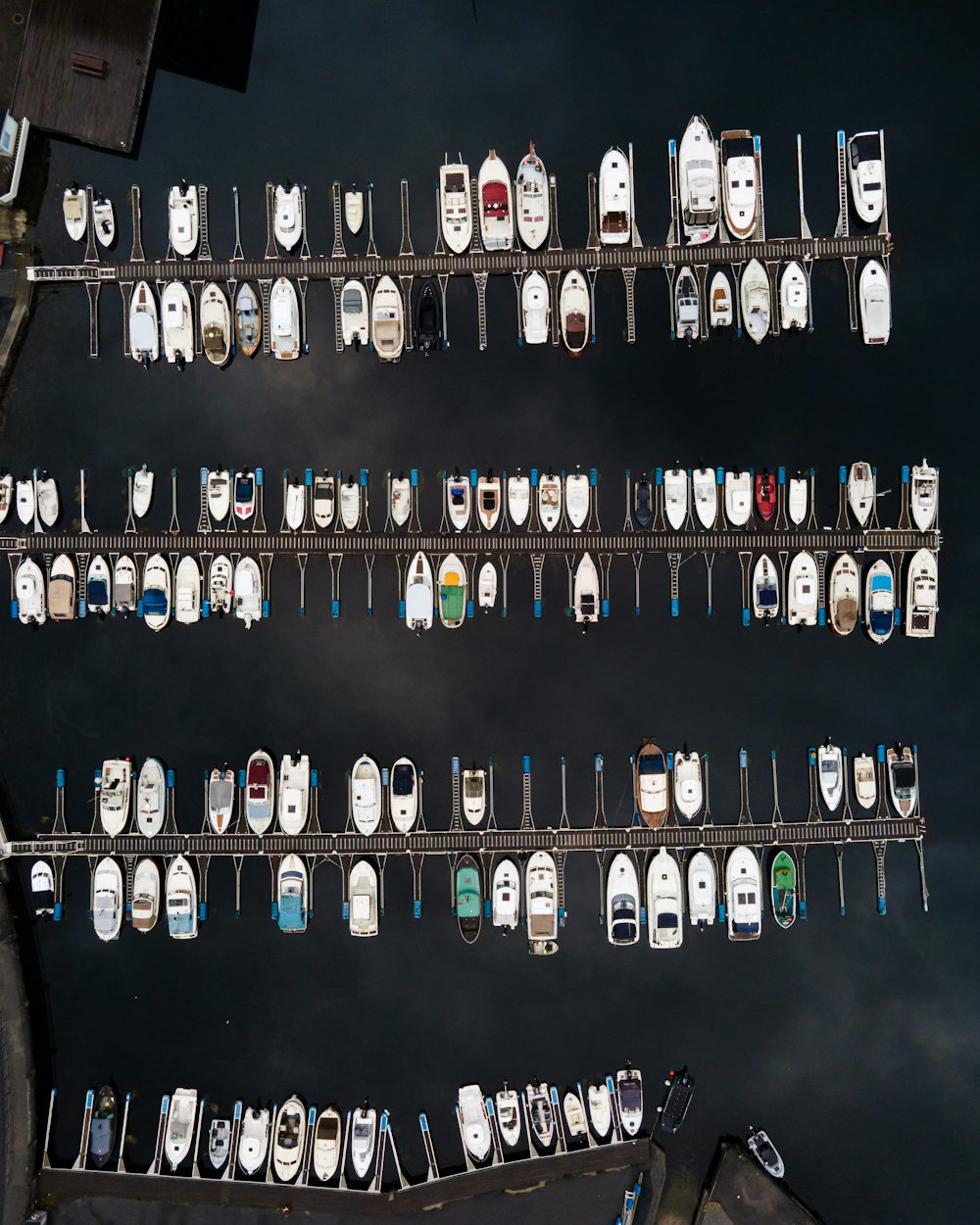 white and black cars on parking lot