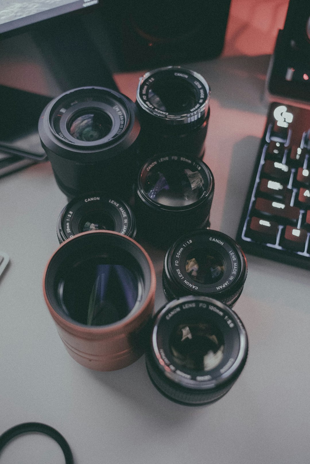 black plastic cups on white table