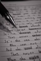 black pen on white paper