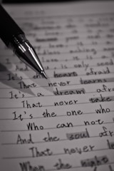 black pen on white paper