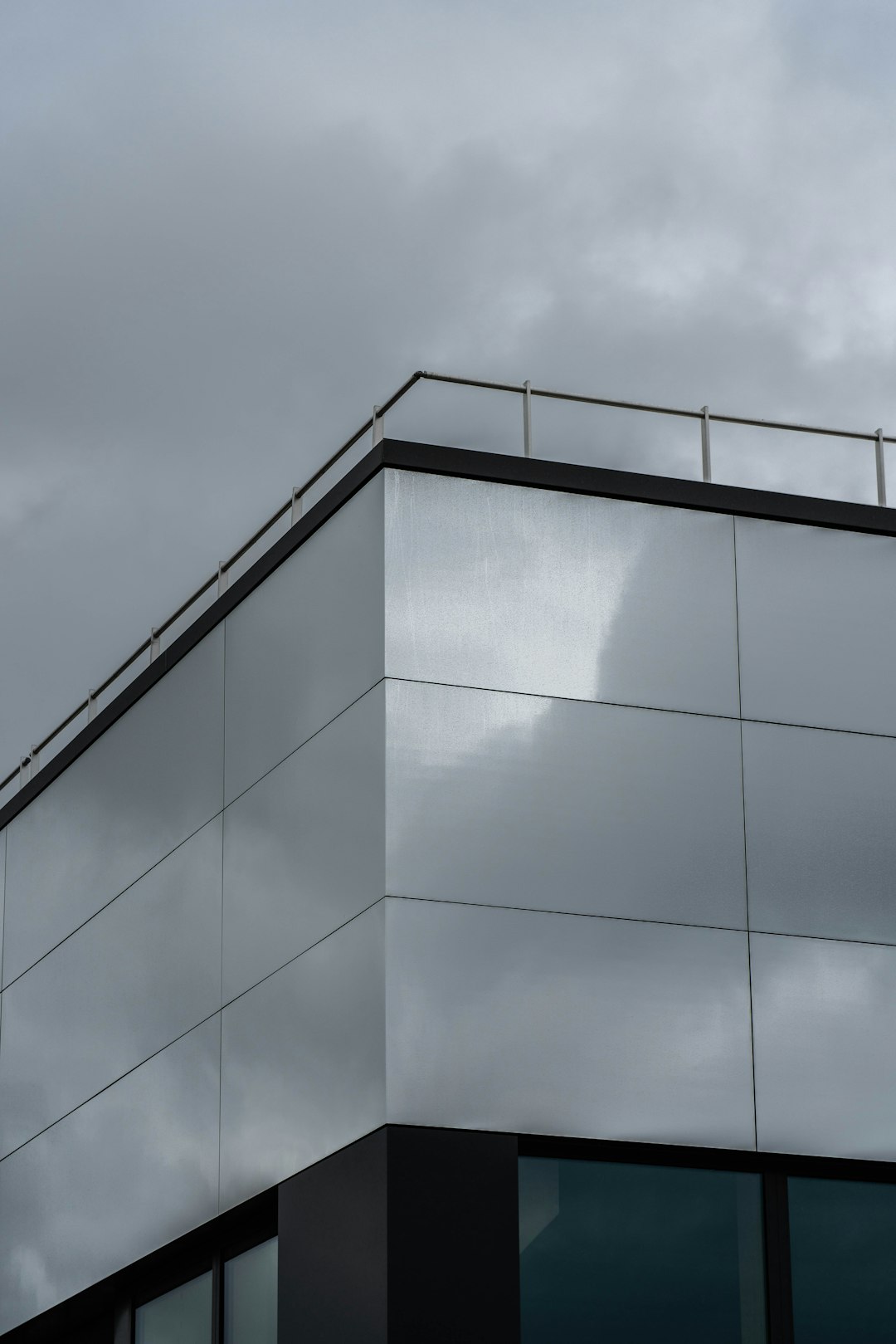 black and gray building under blue sky