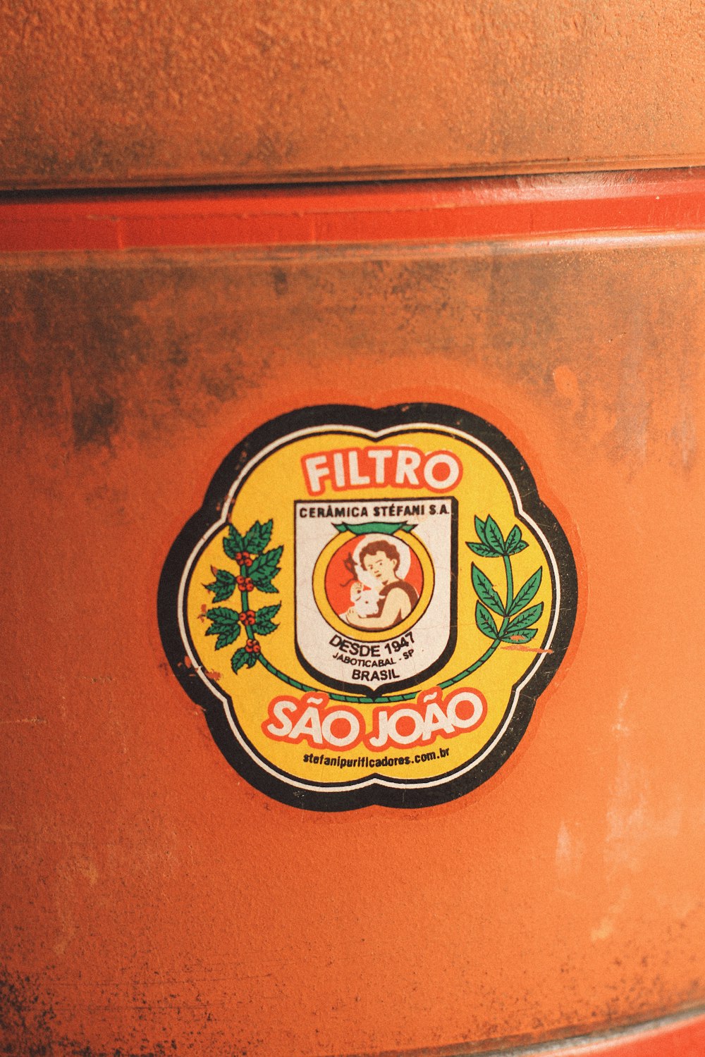 a close up of a sticker on the side of a suitcase