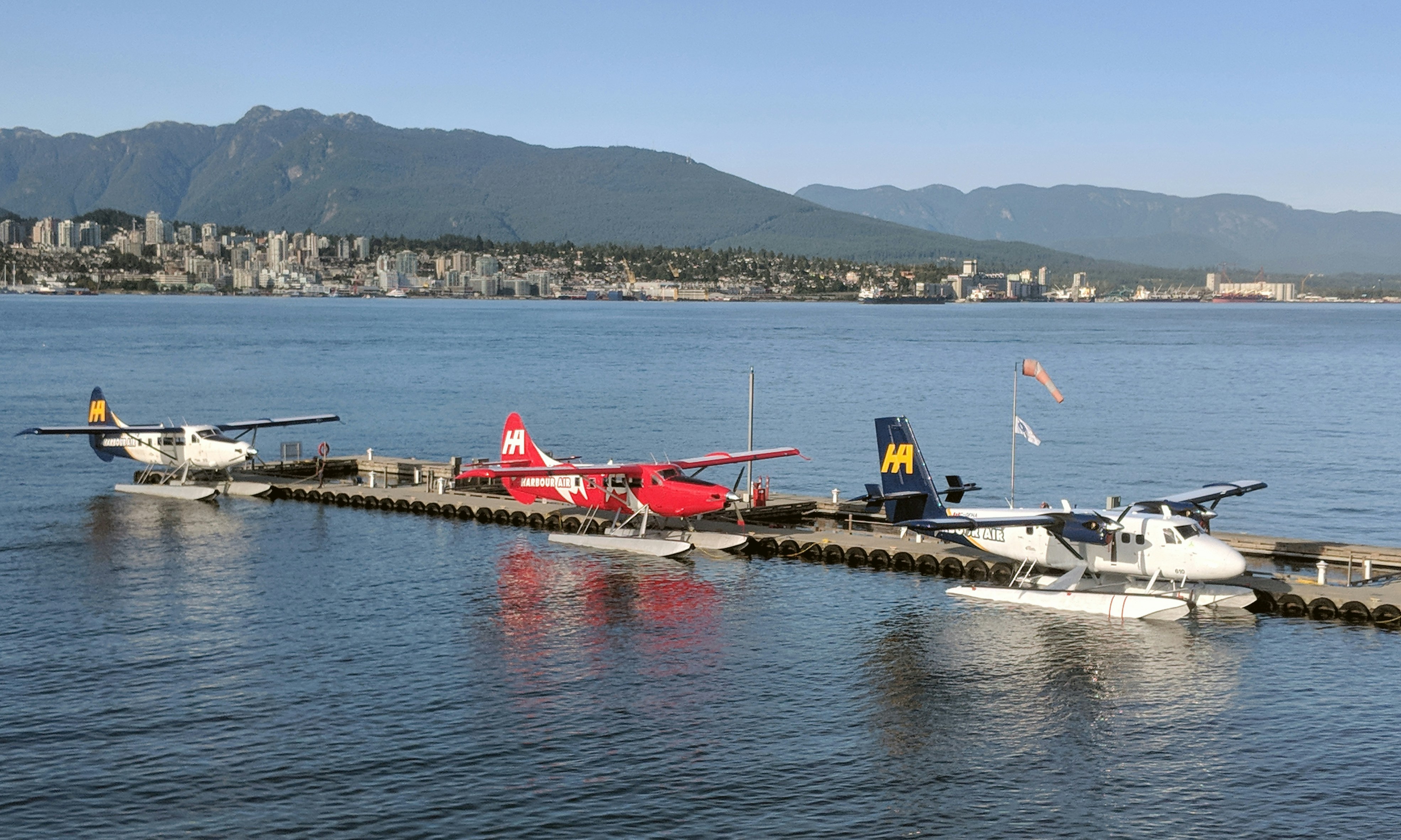 red and white boat on sea during daytime