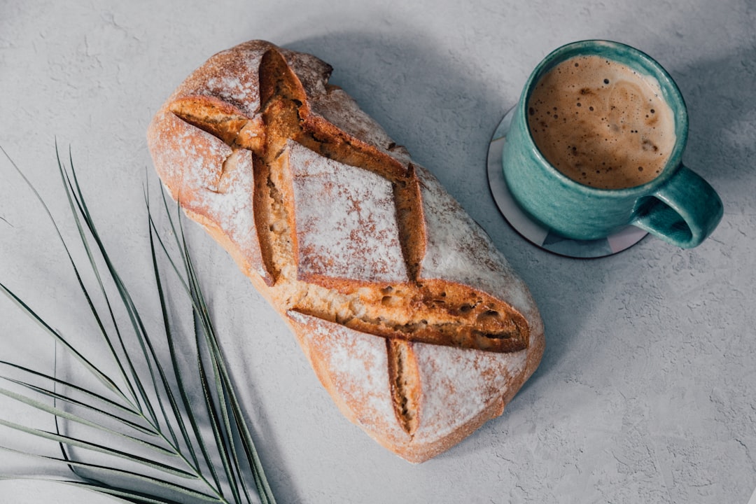 bread on white and blue ceramic plate