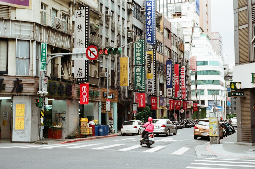 cars on road in city during daytime