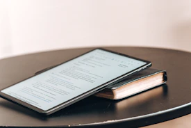 A close-up of a person reading a detailed legislative document on a tablet.