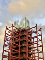 brown wooden tower under cloudy sky