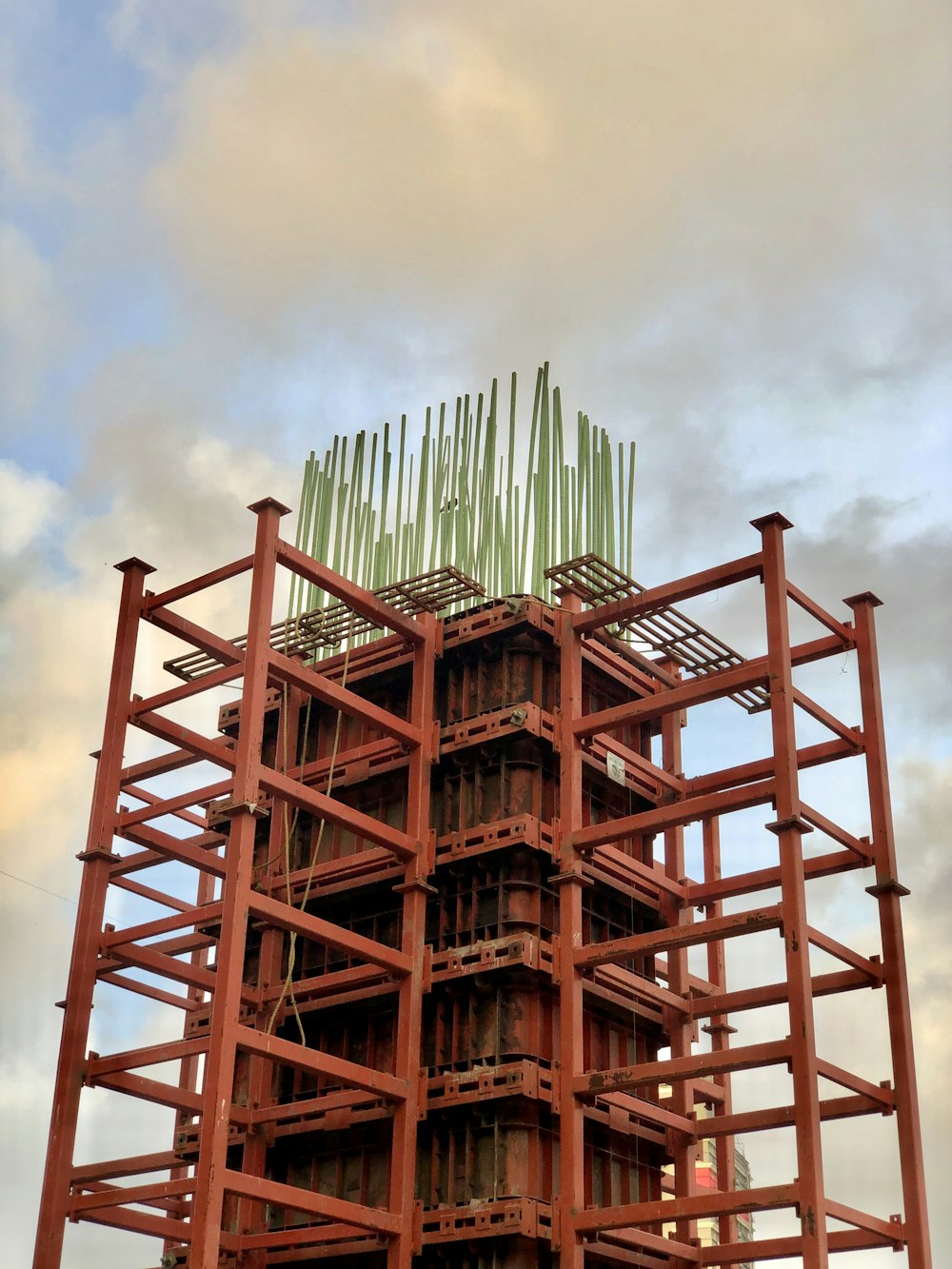 brown wooden tower under cloudy sky