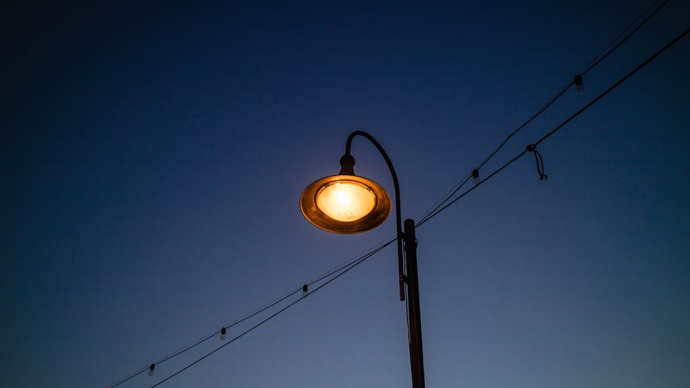 black and white street light turned on during night time