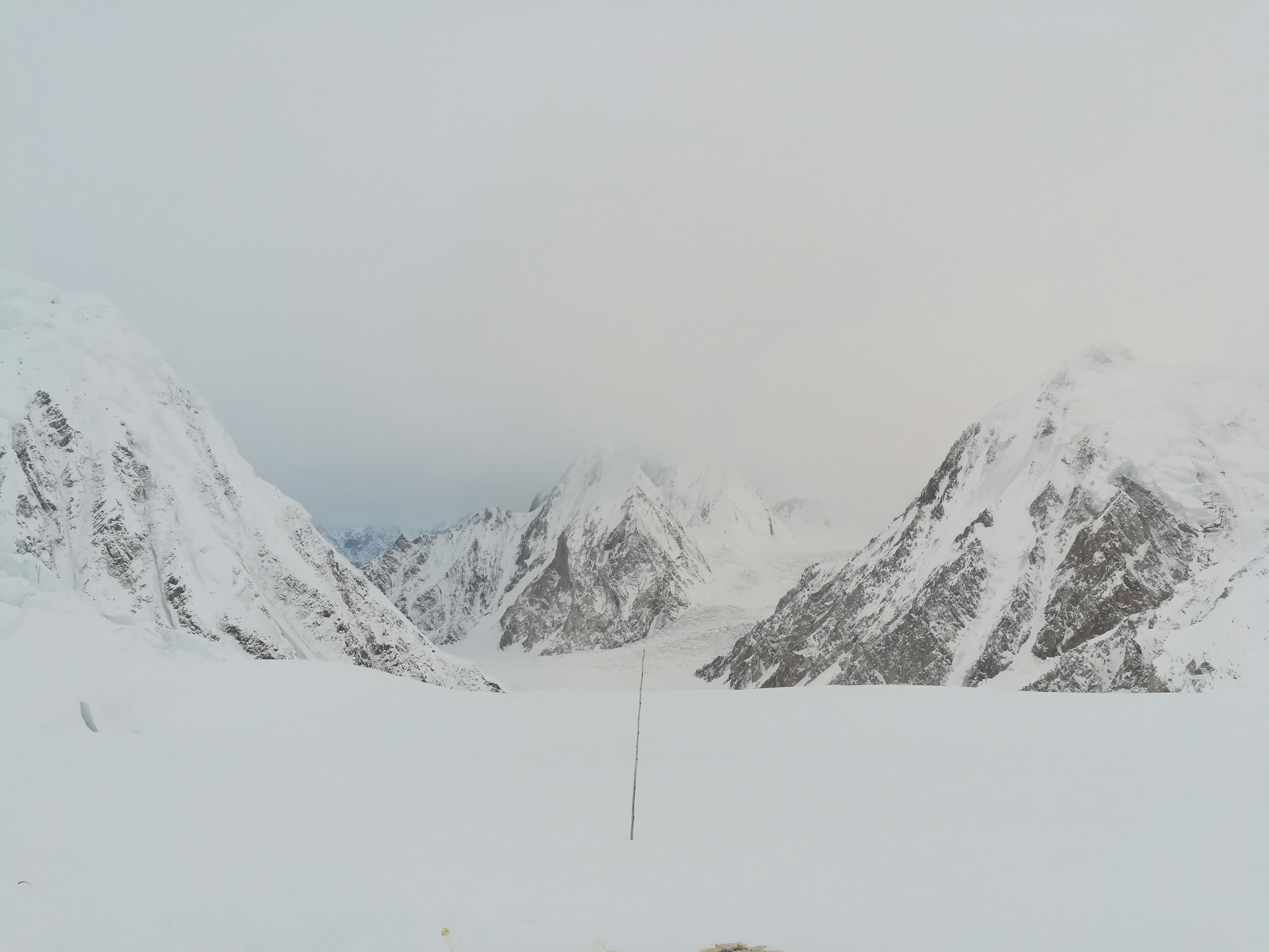 snow covered mountain during daytime